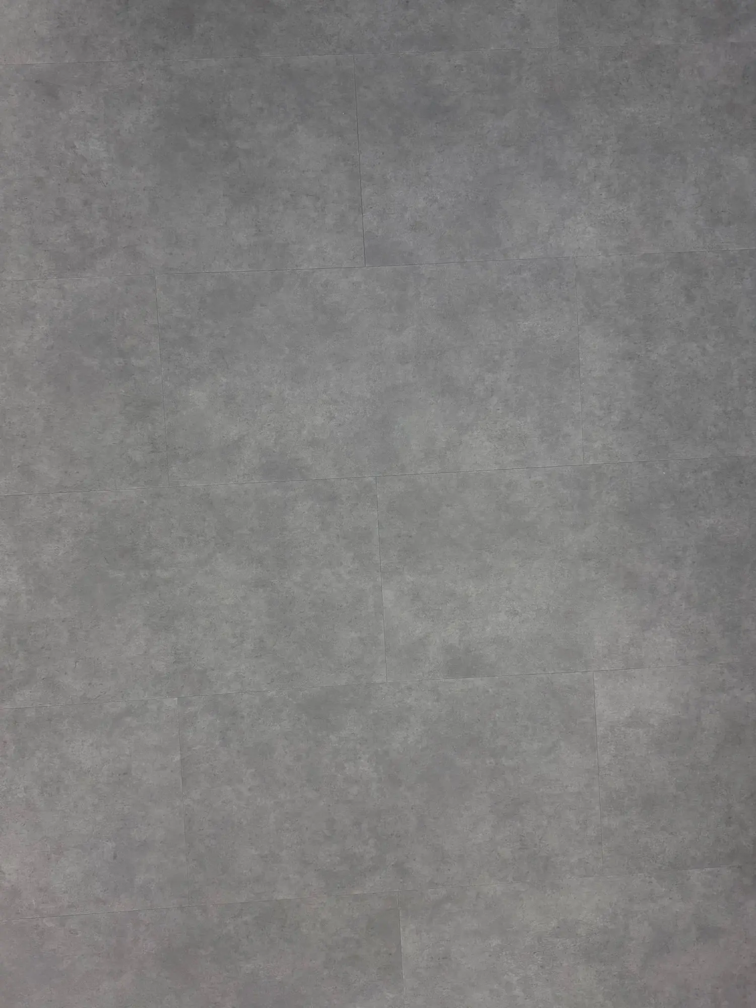 Grey Slate SPC Click – close-up photograph of the grey stone-effect tile surface