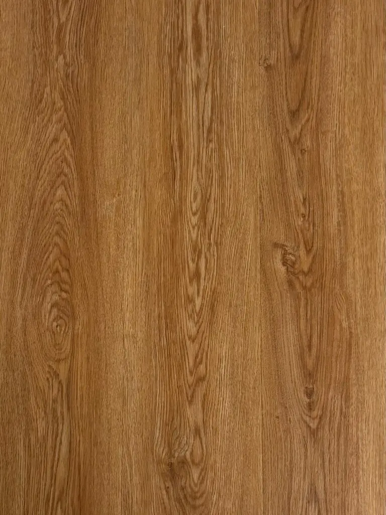 Honey Oak LVT plank flooring – photograph of the actual product showing its warm golden honey oak grain