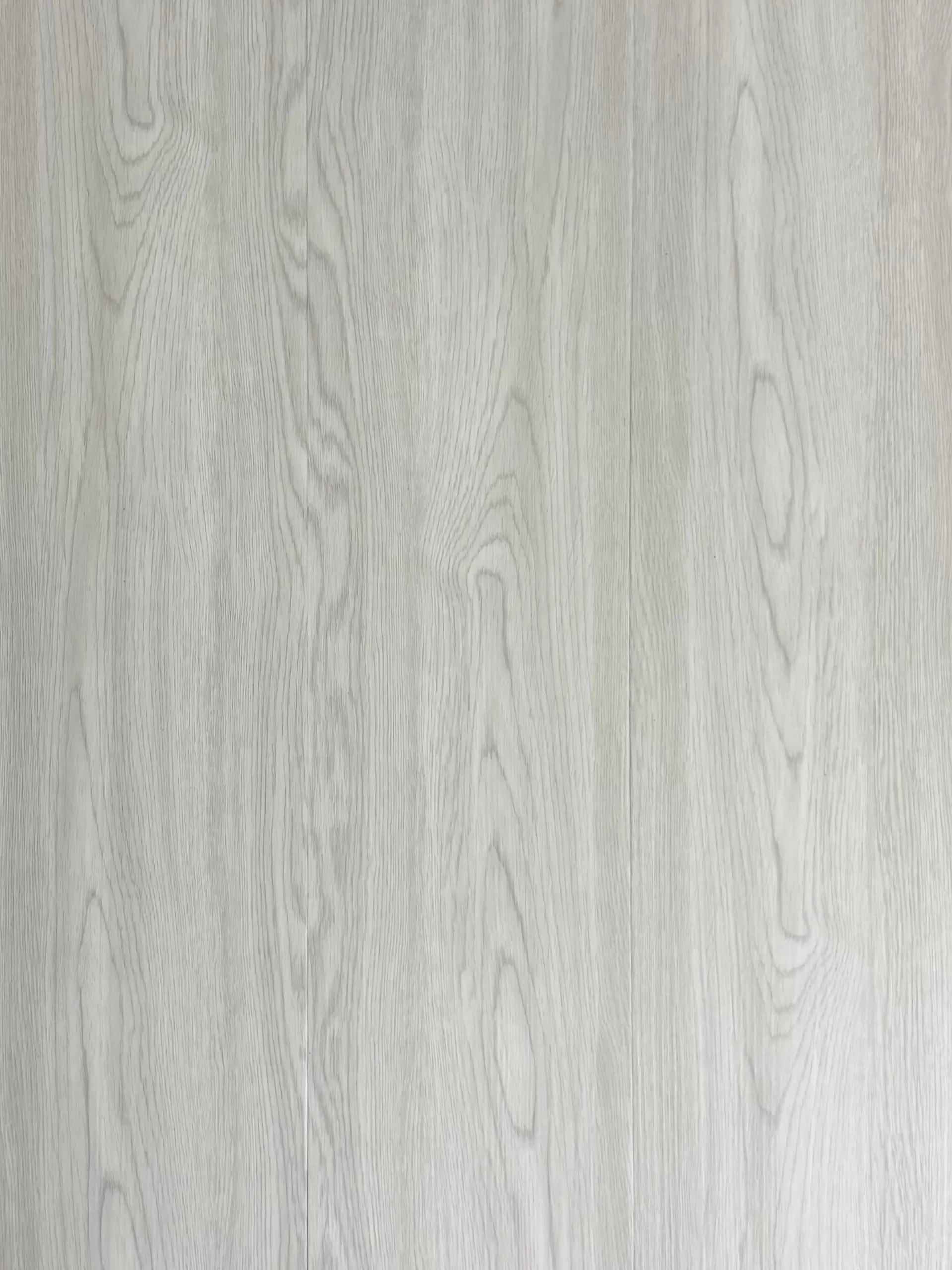 Narvik Grey LVT plank flooring – photograph of the actual product showing its pale cool-grey oak grain