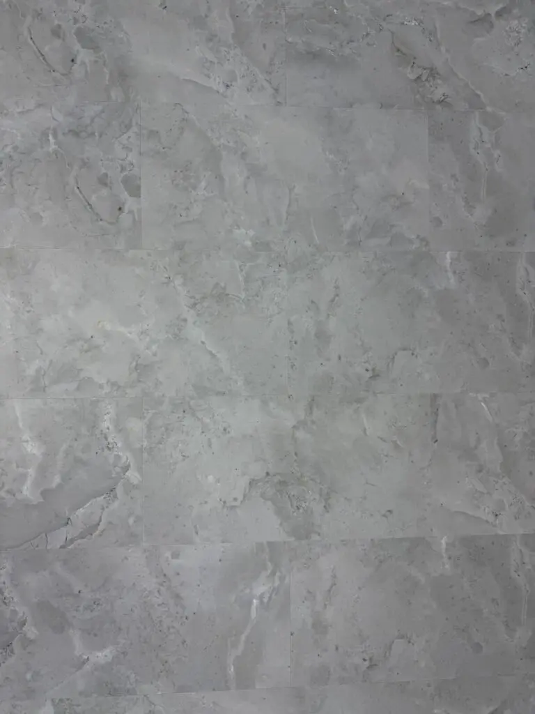 Sandstone SPC Click – close-up photograph of the grey stone-effect tile surface