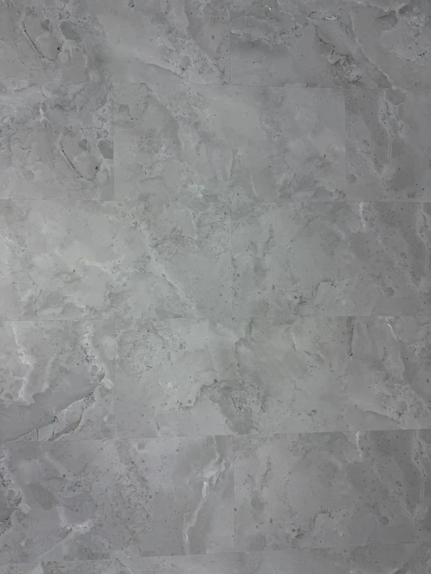Sandstone SPC Click – close-up photograph of the grey stone-effect tile surface