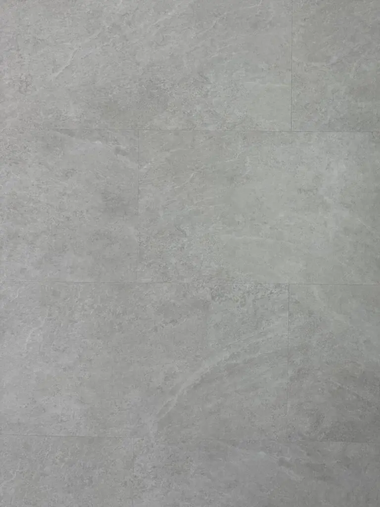 Silver Moon SPC Click – close-up photograph of the light grey stone-effect tile surface