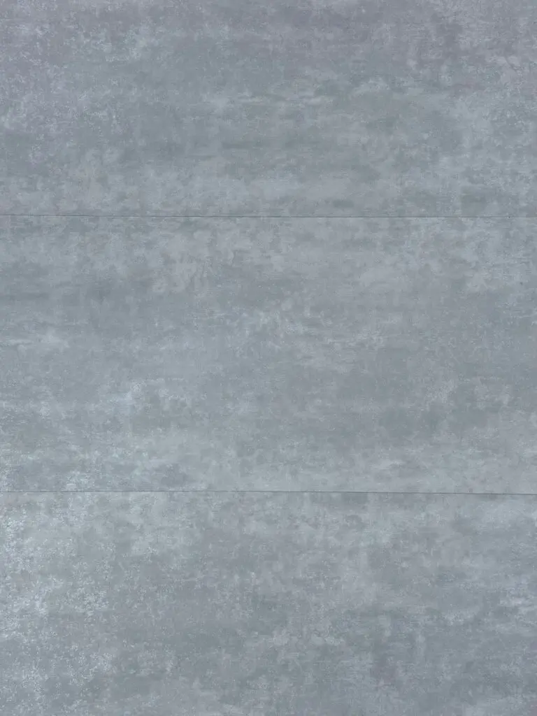 Travertino LVT flooring – photograph of the actual product showing its light grey cement-effect stone finish