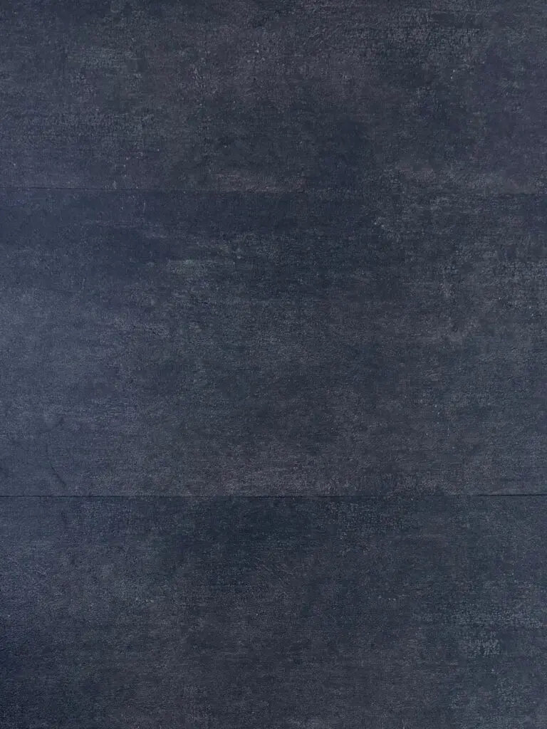 Verona Stone LVT flooring – photograph of the actual product showing its deep charcoal stone-effect finish