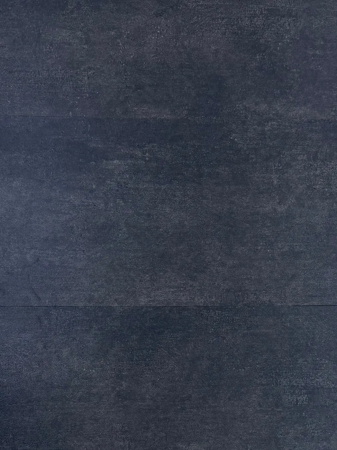 Verona Stone LVT flooring – photograph of the actual product showing its deep charcoal stone-effect finish