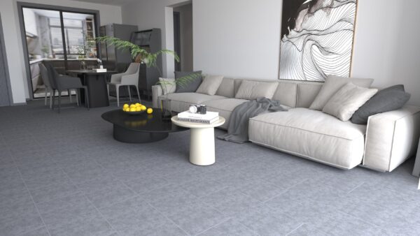 Grey Slate SPC Click flooring laid in a living room with grey stone-effect tiles